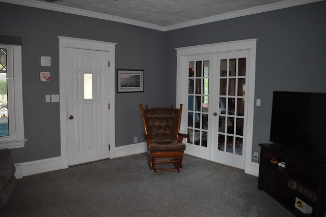 entryway featuring a textured ceiling, dark carpet, crown molding, and french doors