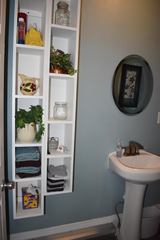 bathroom featuring built in shelves