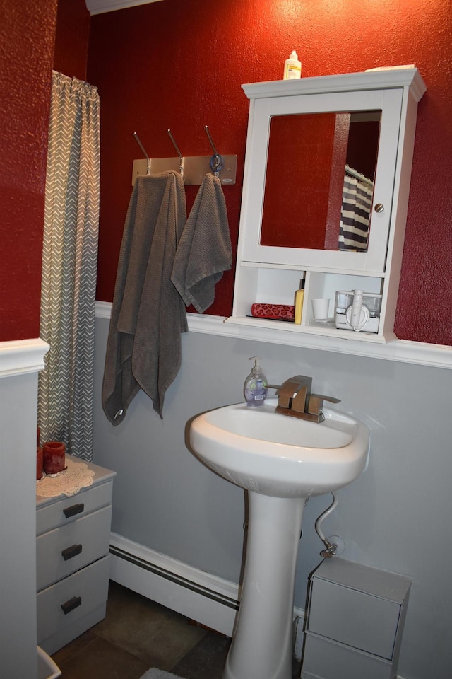 bathroom featuring a baseboard radiator