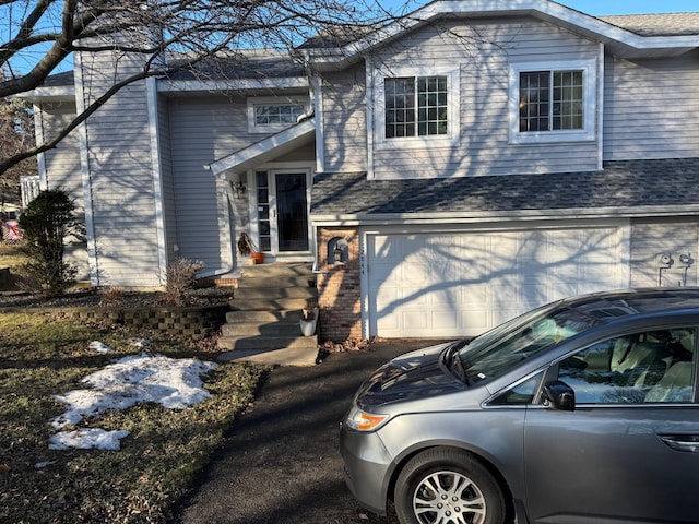 view of front of home with a garage