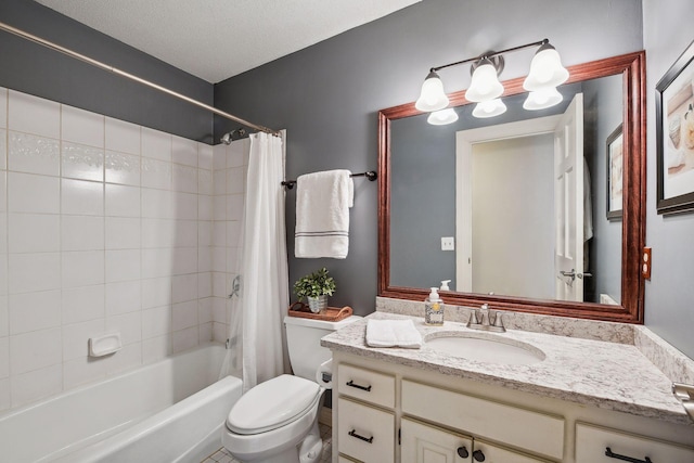 full bathroom with toilet, vanity, shower / bath combination with curtain, and a textured ceiling