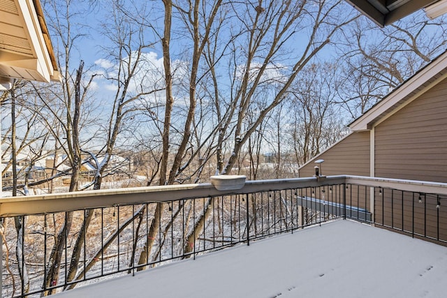 view of snow covered deck