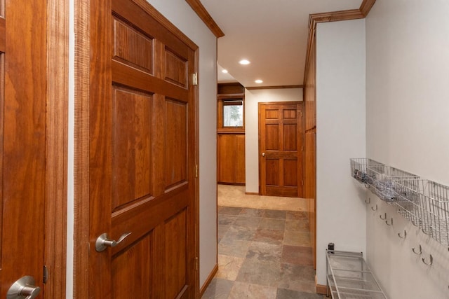 corridor featuring ornamental molding