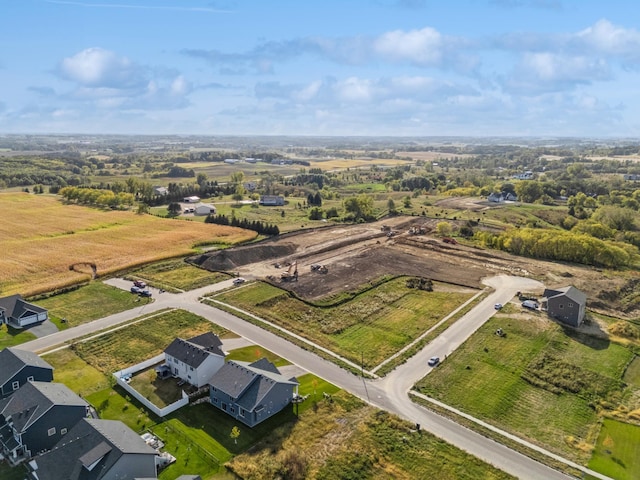 birds eye view of property featuring a rural view