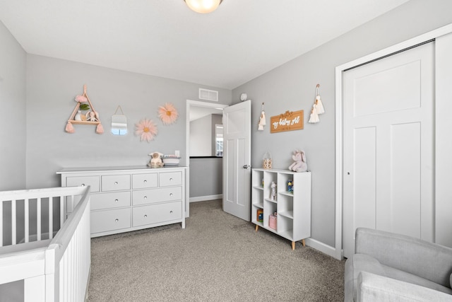 bedroom with a nursery area, visible vents, baseboards, and light colored carpet