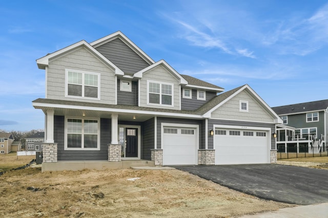 craftsman-style house with a garage