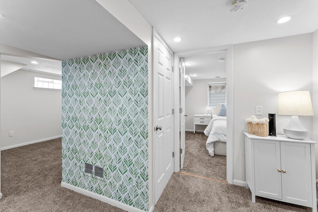 ensuite bathroom featuring visible vents, recessed lighting, baseboards, and ensuite bathroom