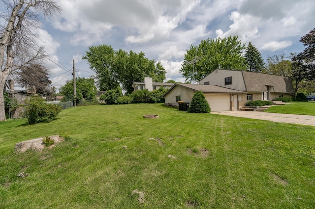 view of yard with a garage