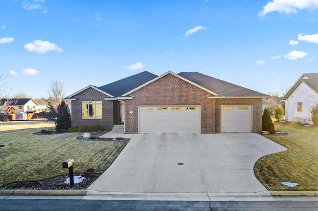 ranch-style house featuring a garage and a front yard