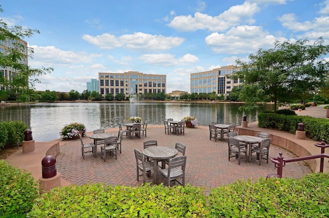 view of patio with a water view