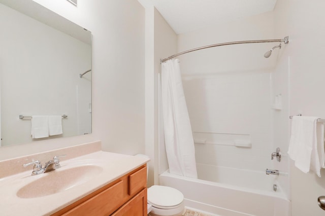 full bathroom with vanity, toilet, and shower / bath combo with shower curtain