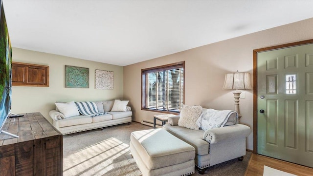 living room with light wood-type flooring and baseboard heating