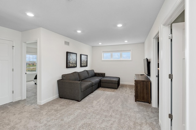 living room with light colored carpet