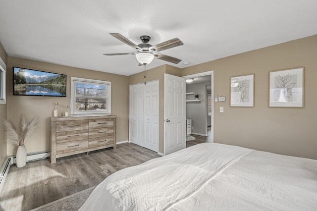 bedroom with hardwood / wood-style floors and ceiling fan