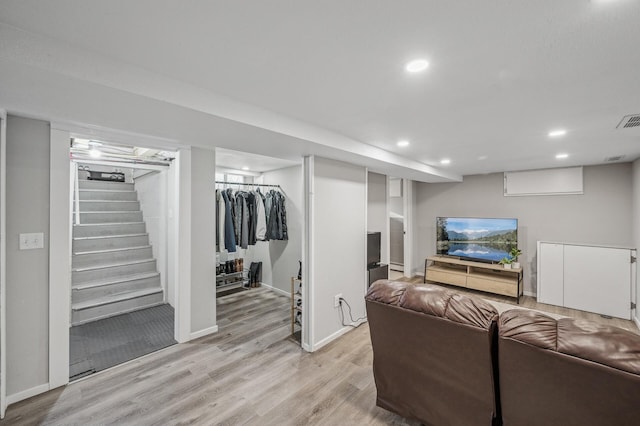 living room with light hardwood / wood-style floors