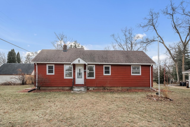 view of front of home with a front yard