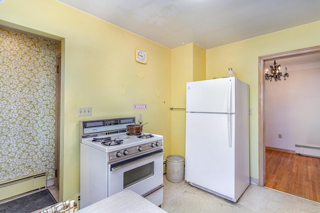 kitchen featuring baseboard heating, white appliances, and an inviting chandelier