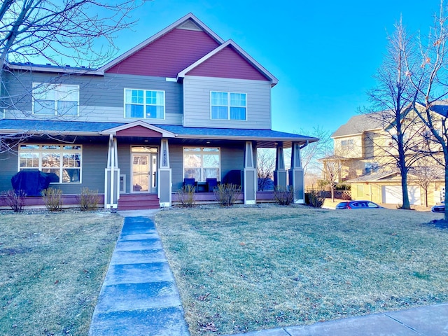 view of front of property with a front lawn and a porch