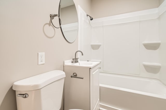 full bathroom with shower / bathtub combination, vanity, and toilet