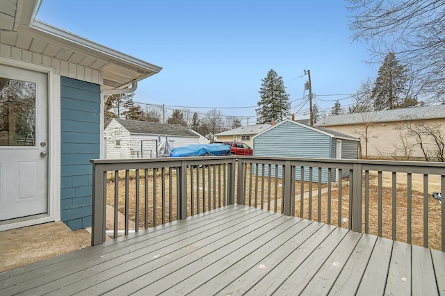 wooden deck featuring a shed