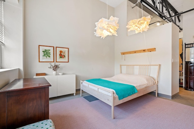 bedroom with a high ceiling