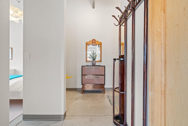 hallway with light tile patterned floors