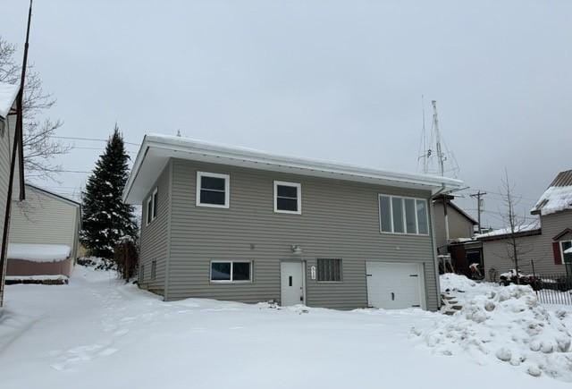 view of snow covered house