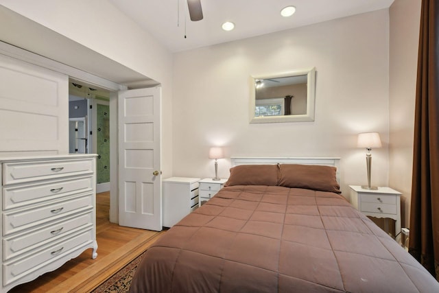 bedroom featuring ceiling fan and light hardwood / wood-style floors