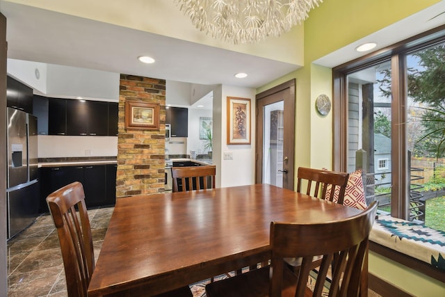 dining area featuring a chandelier