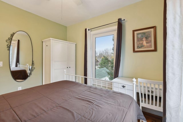 bedroom featuring hardwood / wood-style floors and ceiling fan