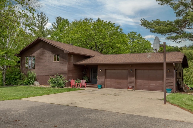 view of front of house with a garage, concrete driveway, roof with shingles, and a front lawn