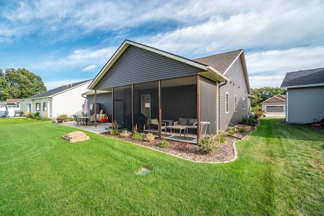 rear view of house featuring a sunroom, a patio area, outdoor lounge area, and a lawn