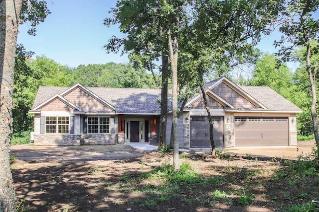 craftsman-style home with a garage