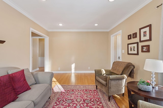 living room featuring crown molding and light hardwood / wood-style floors