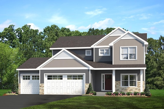 craftsman house featuring a garage and a front lawn