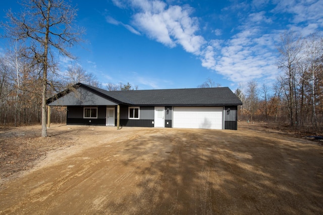 view of front of home featuring driveway and an attached garage