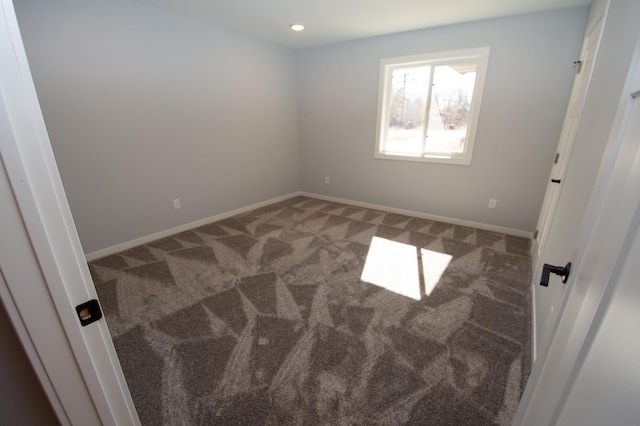 empty room with recessed lighting, carpet flooring, and baseboards