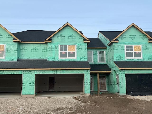 property in mid-construction featuring a garage