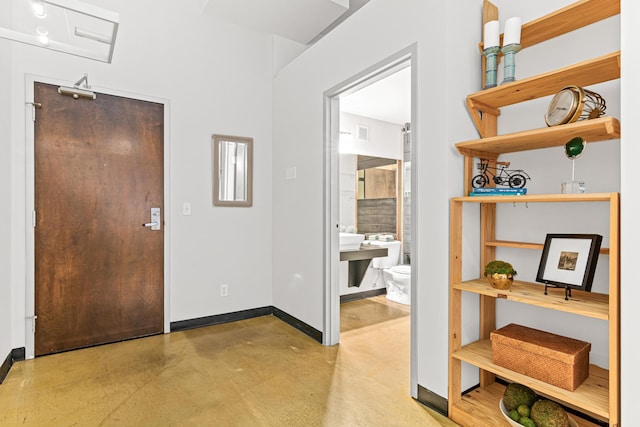 entryway featuring concrete flooring