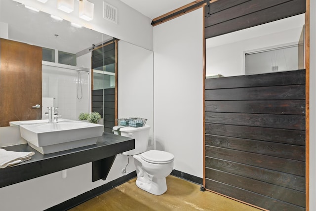 bathroom featuring sink, toilet, and walk in shower