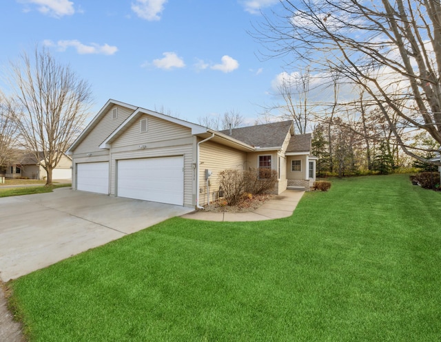 single story home featuring a garage and a front yard