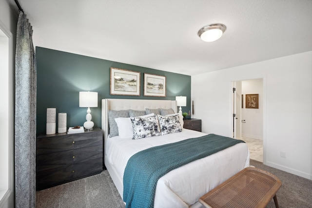 bedroom with carpet flooring and ensuite bathroom