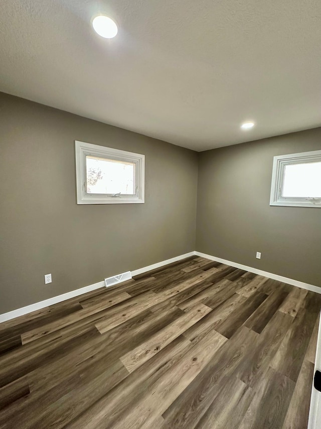 912 Oakley St, Luverne, MN 56156 - spare room with hardwood / wood-style floors
