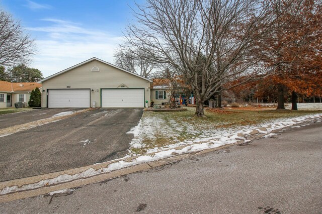 single story home with a garage