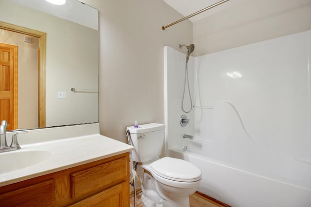 full bathroom featuring vanity, toilet, and shower / bathtub combination