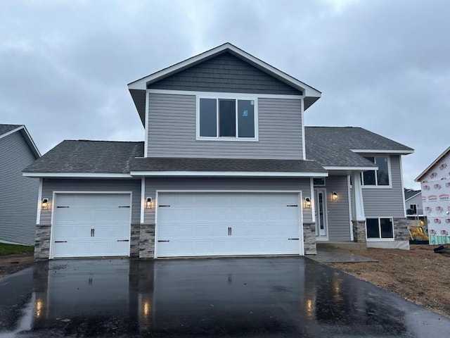 view of front of property with a garage