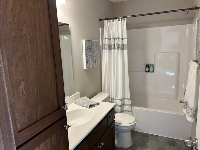 full bathroom with shower / bath combo with shower curtain, toilet, and vanity