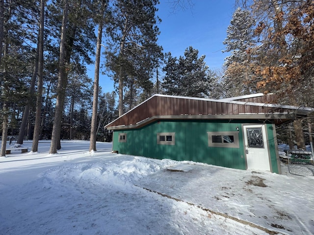 view of snow covered property