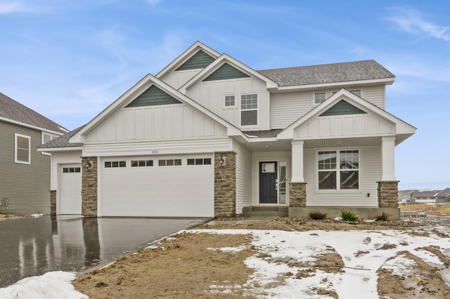 craftsman-style home with a garage