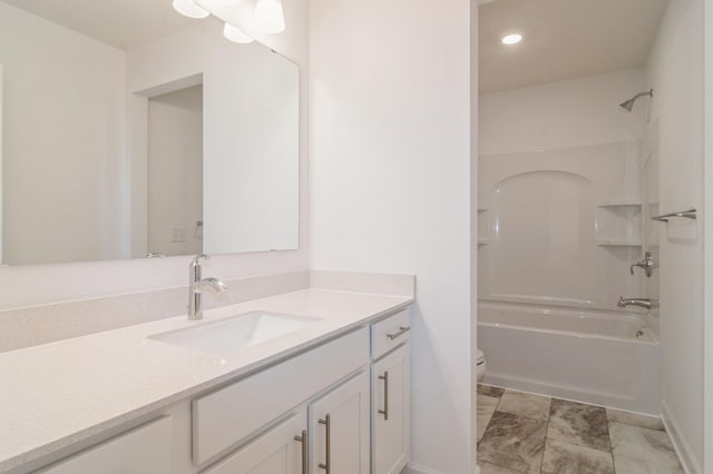 full bathroom with vanity, toilet, and shower / tub combination